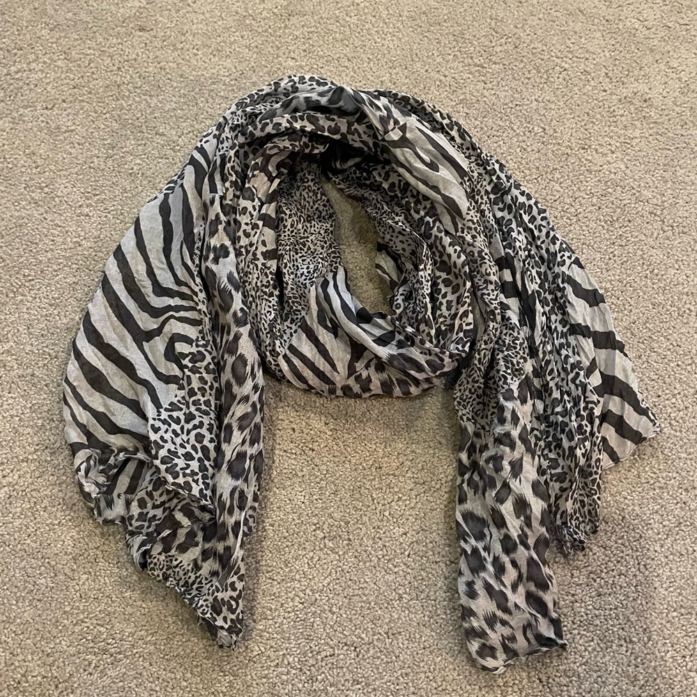 Lightweight scarf/wrap in a pale blue leopard print